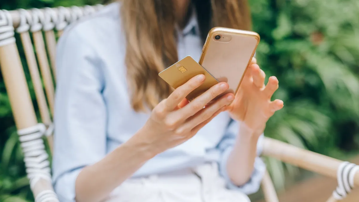 Someone using mobile banking on a phone