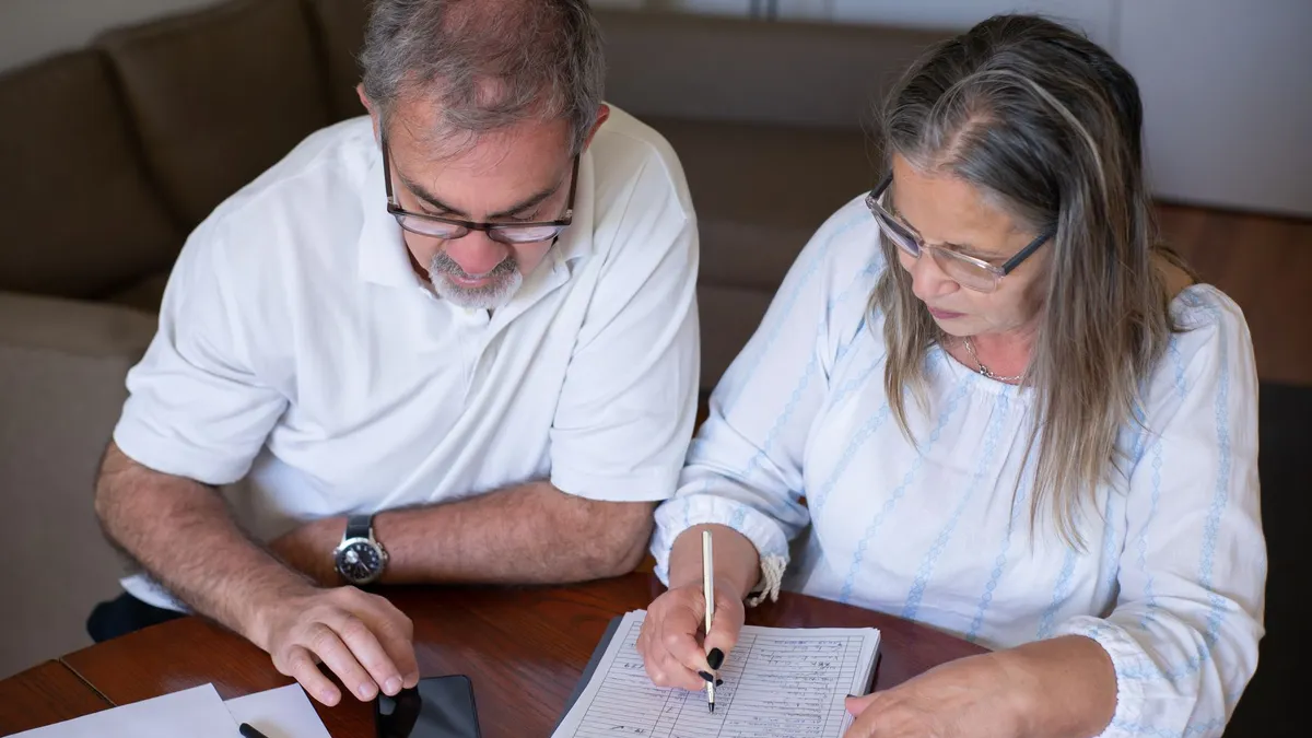An older couple going over their finances
