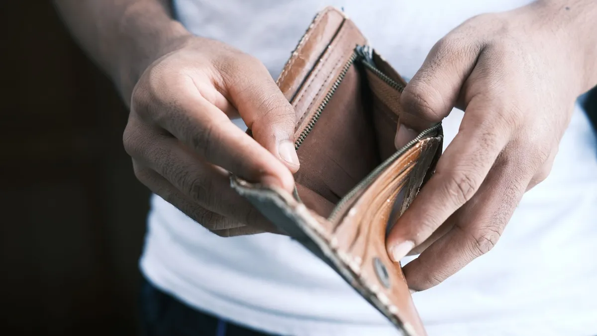 An open, empty wallet